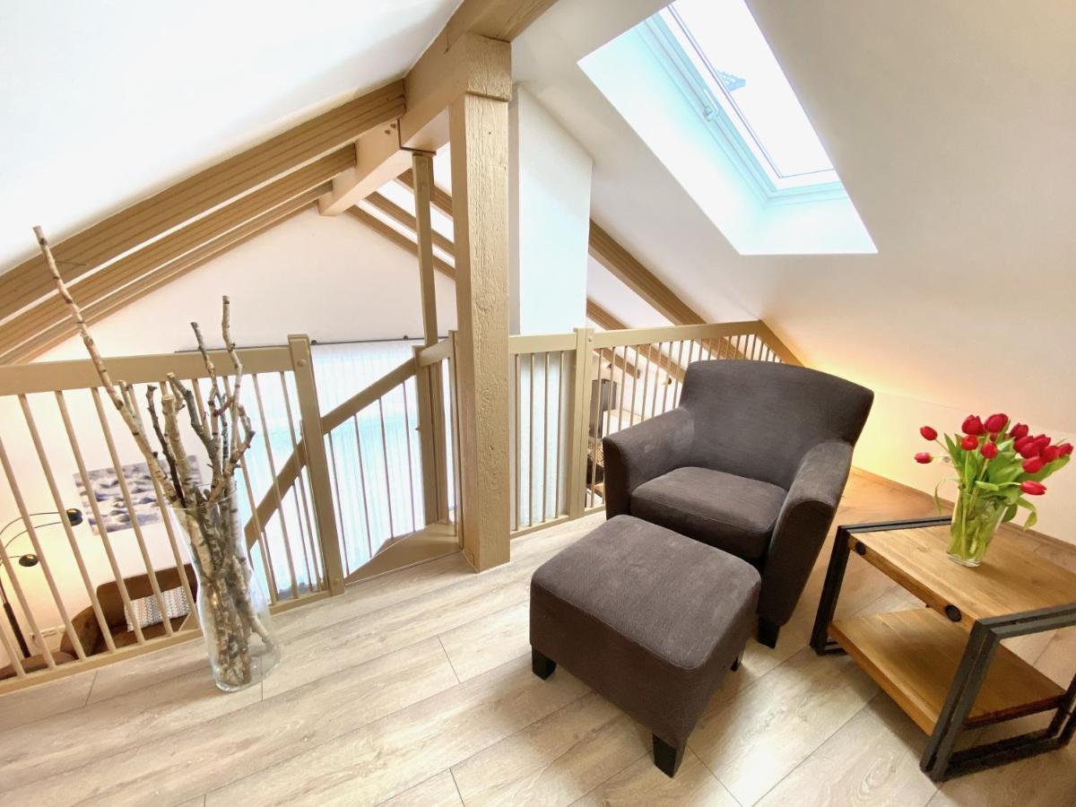 Moenchgut Living & Spa Gager Exterior photo A modern oak staircase