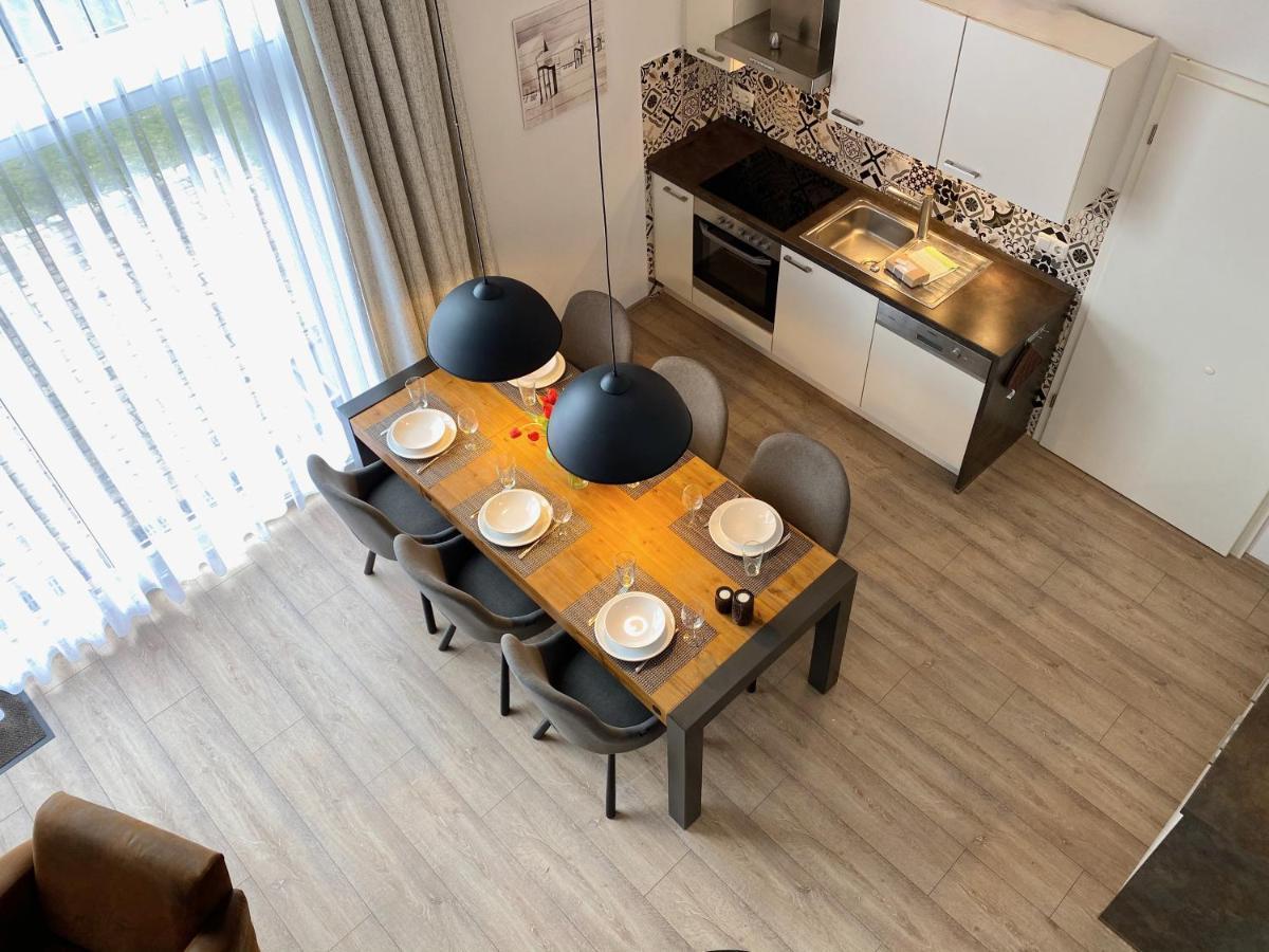 Moenchgut Living & Spa Gager Exterior photo A kitchen in a serviced apartment
